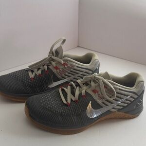 Nike Black and Gray Running Shoes with Silver Logo